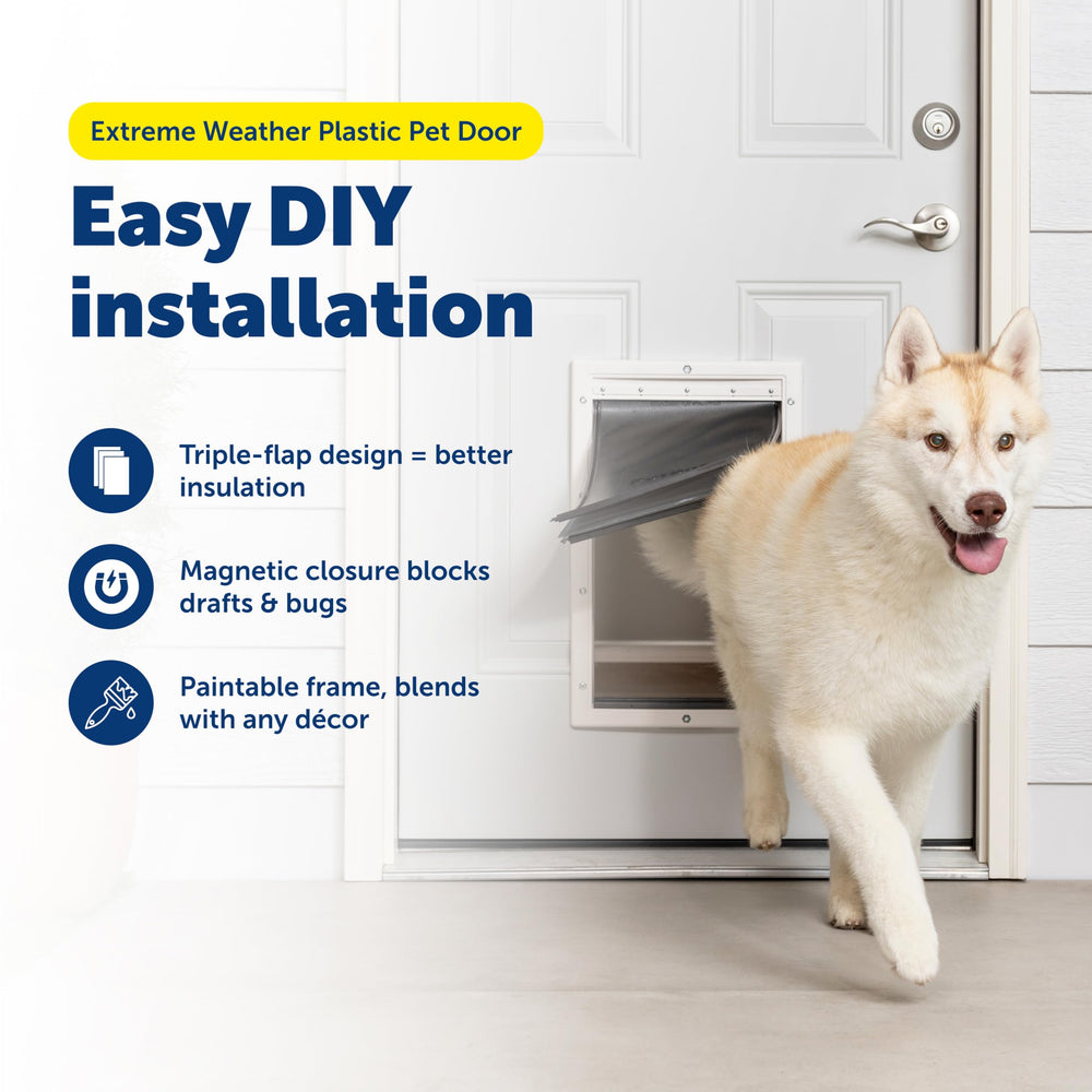 PetSafe Extreme Weather Door in use as a dog enters for independent outdoor access.