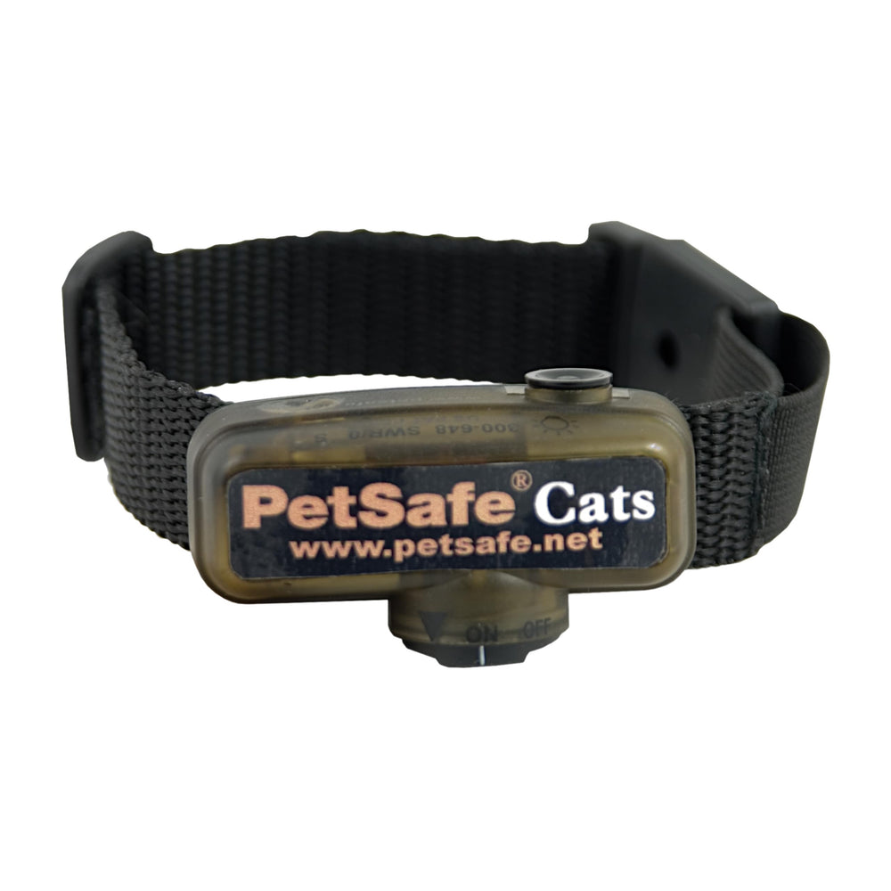 PetSafe In-Ground Fence cat collar waterproof close-up showing outdoor training readiness.