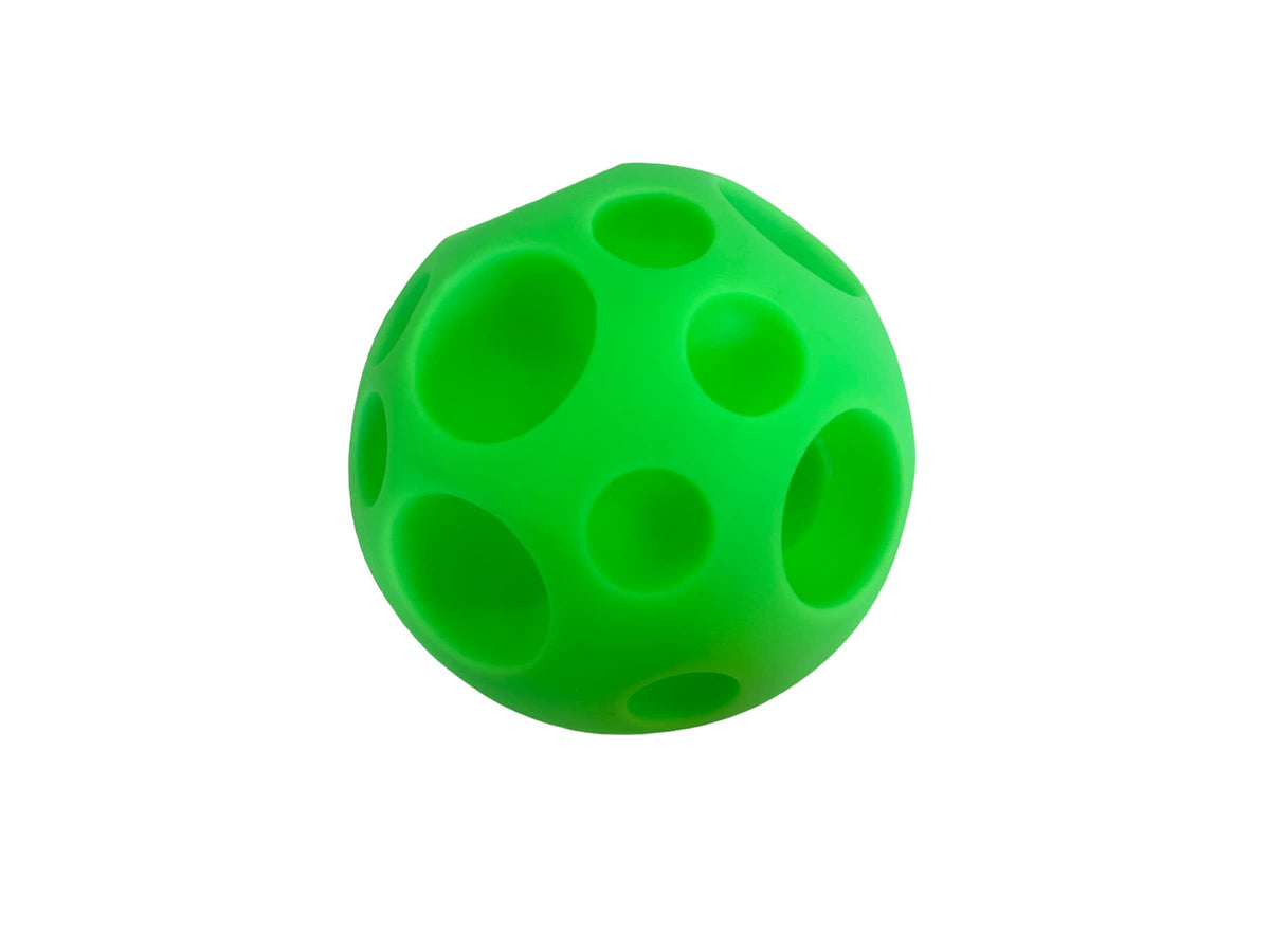 Piggy Poo and Crew large treat ball green side view promotes mental stimulation during solo play.