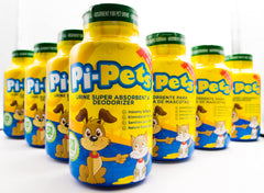 PI-Pets urine absorbent powder dispensing action for quick odor control.