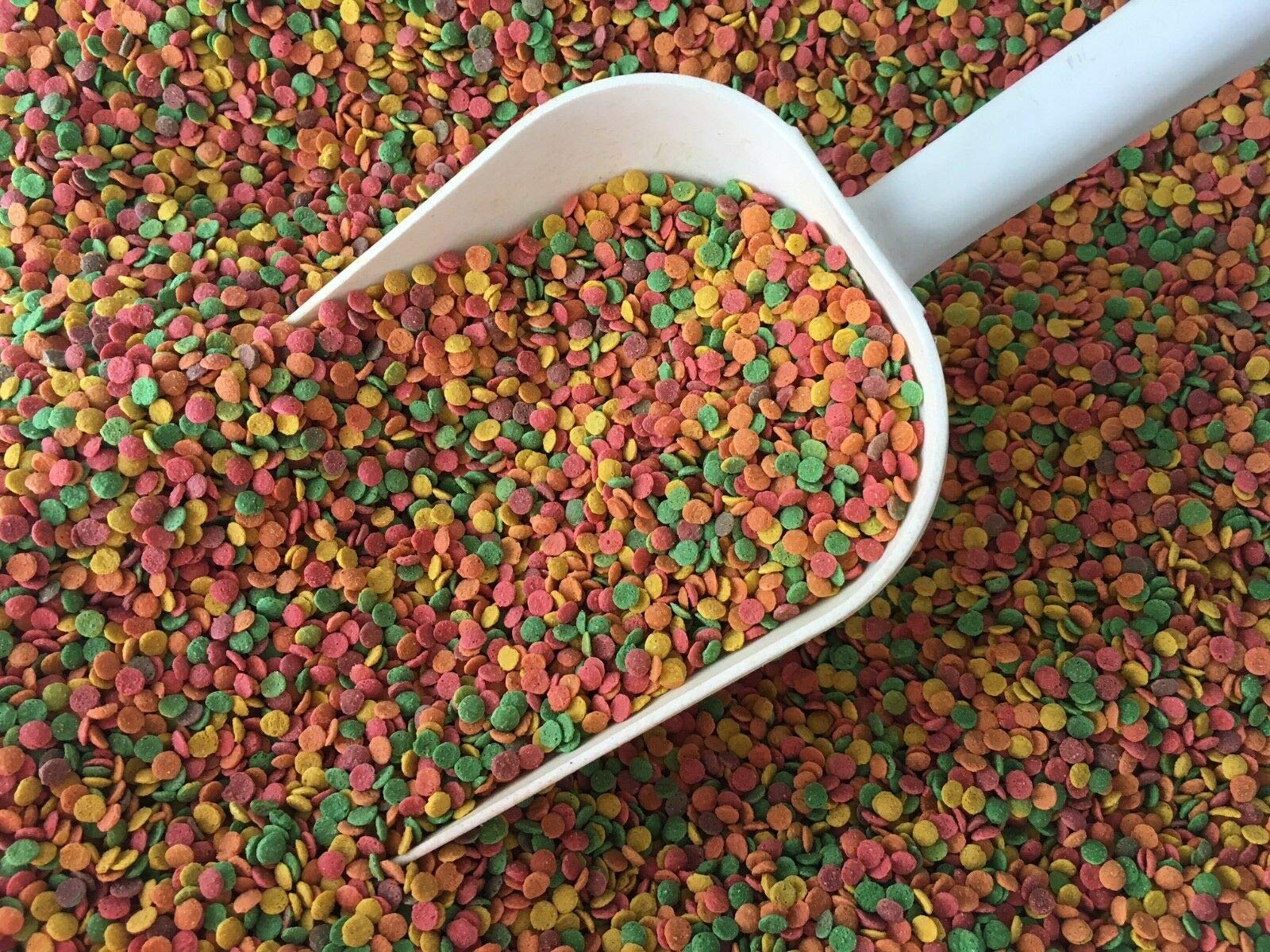 Pretty Bird Daily Select Premium Bird Food closeup pellets highlighting variety for curious eaters