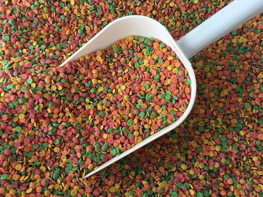 Pretty Bird Daily Select Premium Bird Food closeup pellets highlighting variety for curious eaters