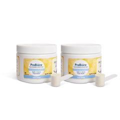 Probiora for Dogs probiotic powder sprinkled on food for fresher breath and healthier gums.