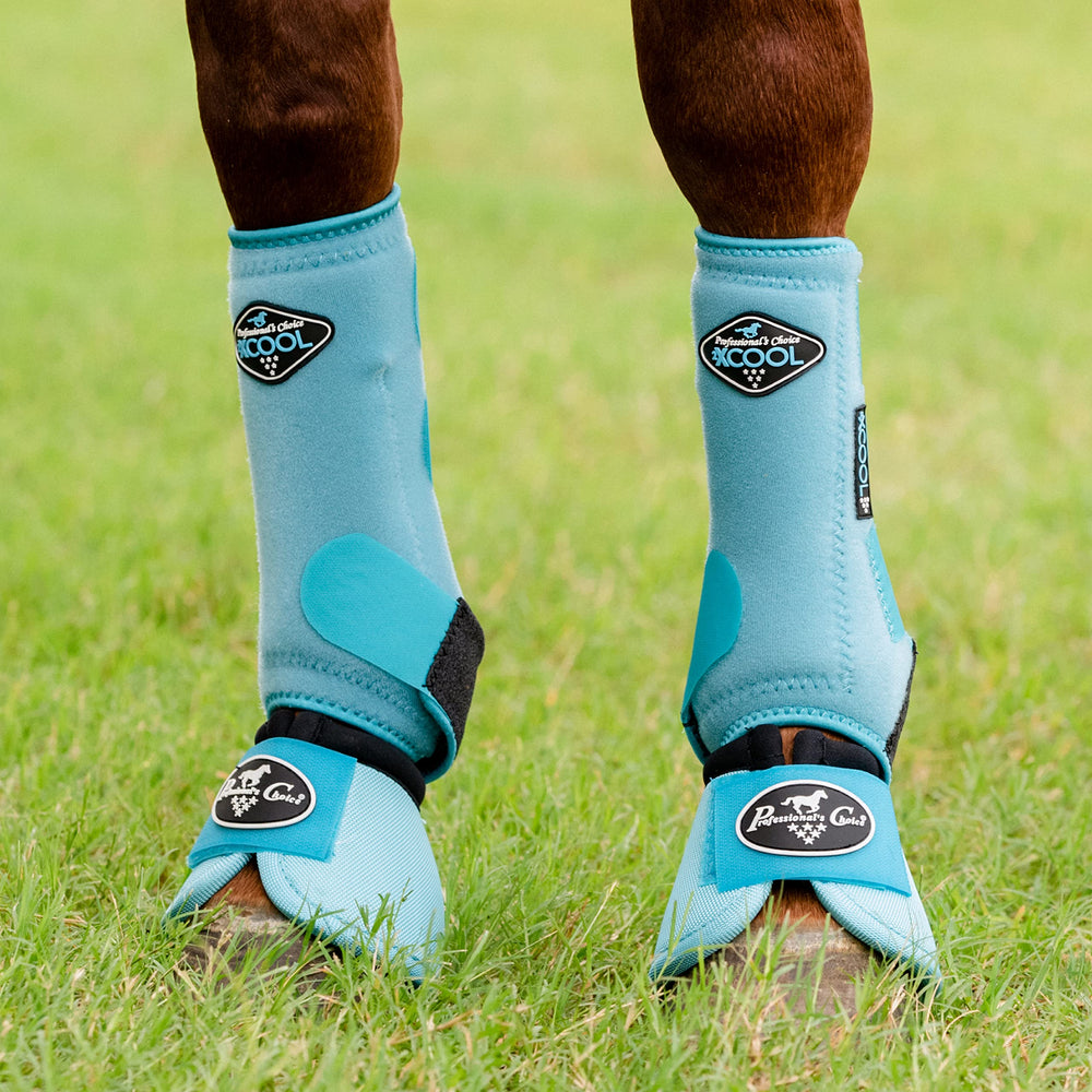 Professional's Choice Ballistic Overreach Bell Boots turquoise closure shows fast, secure quick-wrap fit.