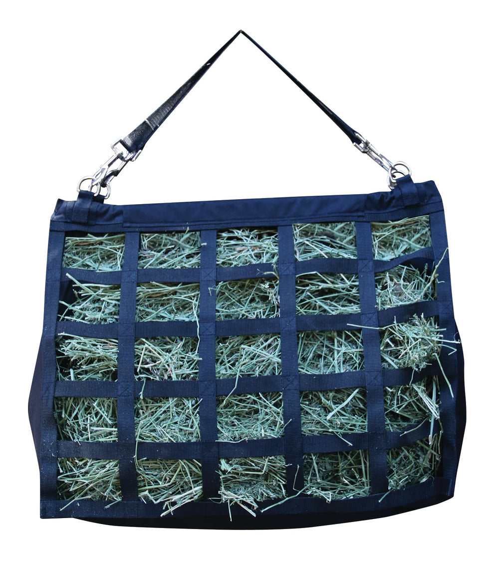 Professional's Choice Medium Feeder Hay Bag hung with adjustable straps for versatile stall or trailer use.