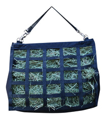Professional's Choice Medium Feeder Hay Bag hung with adjustable straps for versatile stall or trailer use.