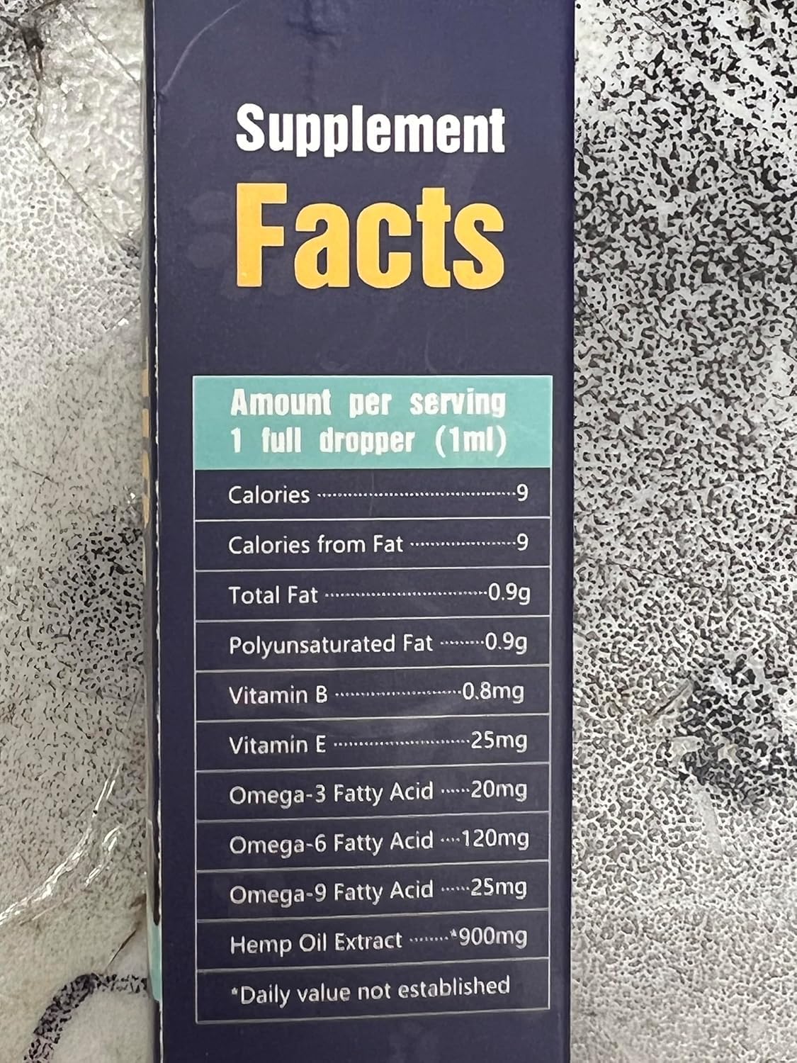PROZIMA hemp oil label closeup emphasizes organic and vet-recommended notes.