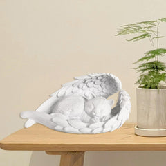 PUPIHOM cat memorial stone outdoors with angel wings offering a lasting tribute