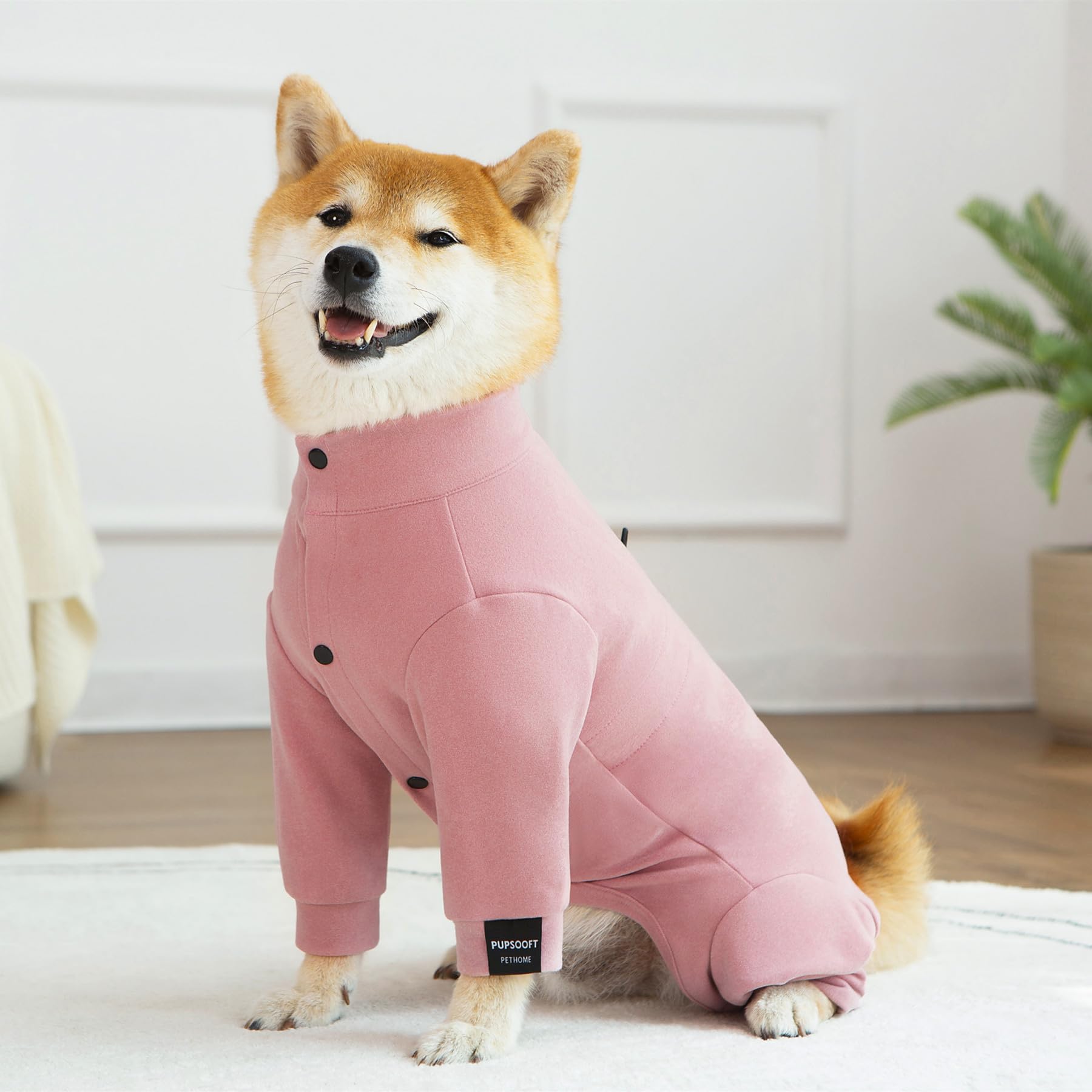 Pupsooft pink dog winter warmer onesie ideal for holidays and parties.