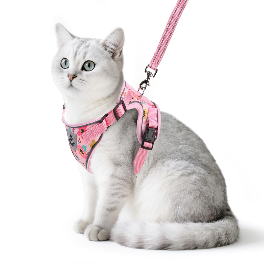Arnés para gato PUPTECK con malla transpirable y flores rosas para paseos cómodos.