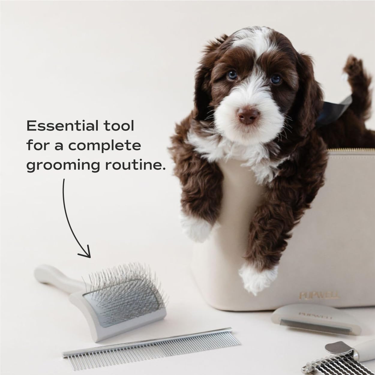 Pupwell Slicker Brush coat care tool distributes natural oils for a healthy shine.