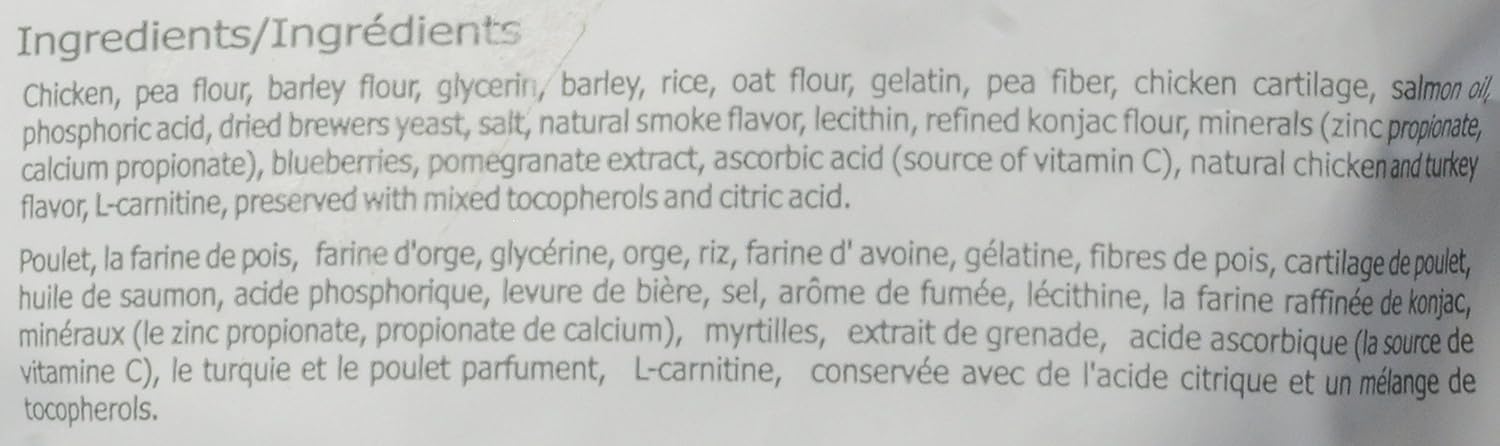 PureVita vitamin-c enriched dog treats packaging; extra vitamin C for everyday nutrition.