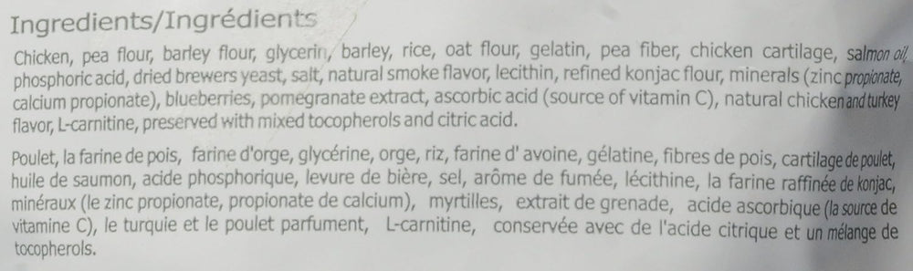 PureVita vitamin-c enriched dog treats packaging; extra vitamin C for everyday nutrition.