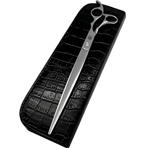 Purple Dragon balanced-design shears in hand showing comfort during grooming.