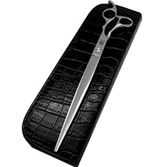 Purple Dragon balanced-design shears in hand showing comfort during grooming.