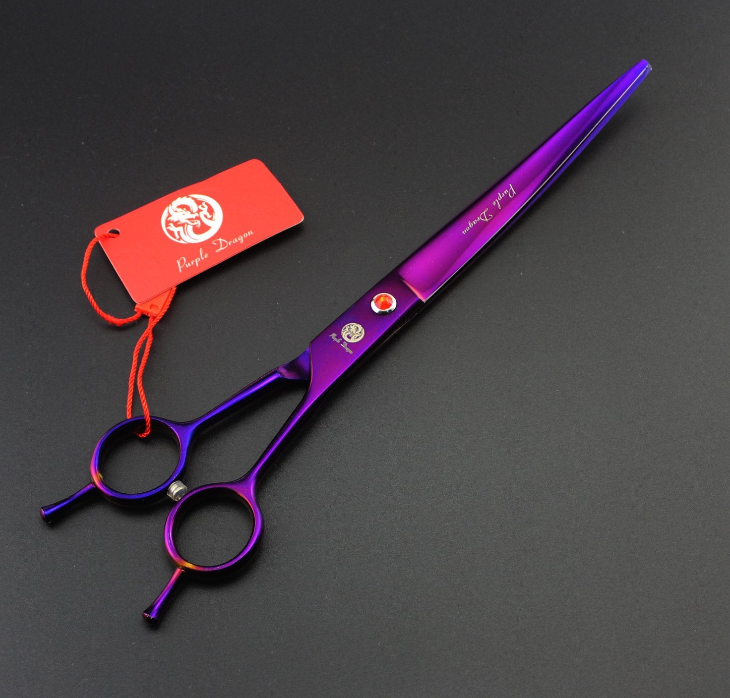 Purple Dragon dog grooming scissors closeup blade highlights sharp, smooth cutting action