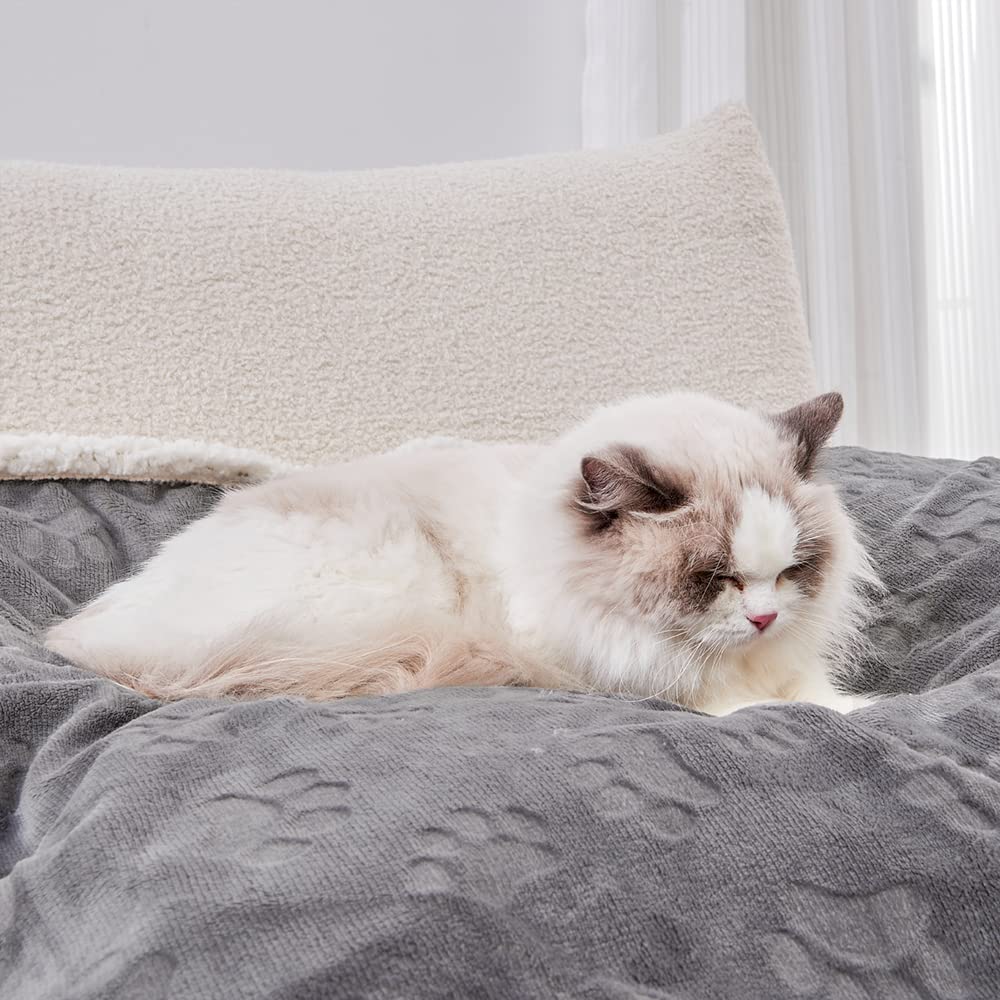 Qeils couch-protection blanket keeps furniture clean from pet hair and spills.