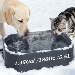 Qvamodo heated water bowl outdoors setup with warmth for pets.