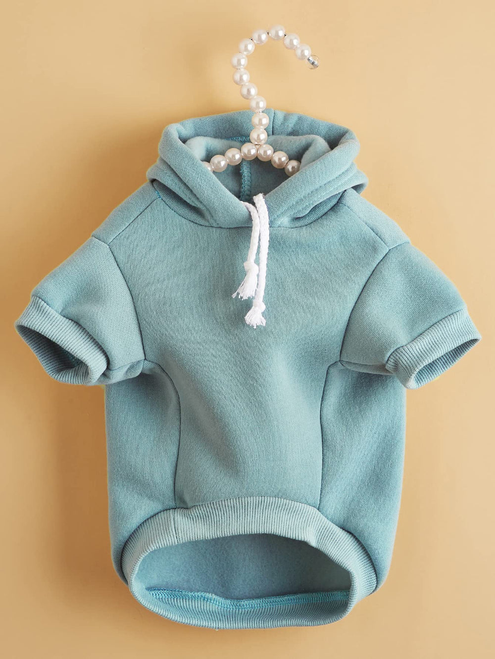 QWINEE hoodie sleeve detail shows stretch fabric for easy on/off daily wear