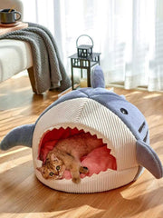 QWINEE Shark-Shaped Cat Mat blue nest interior offers warm, secure hideout for kittens.
