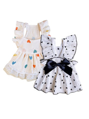 QWINEE heart-pattern dog dress front shows playful style for daily walks and photos.