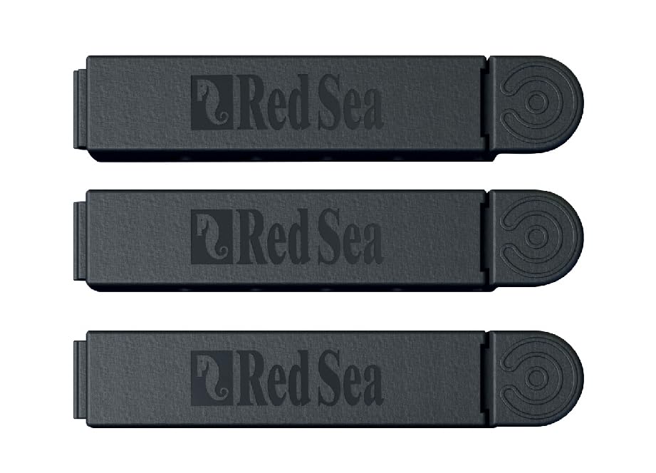 Red Sea ReefDose Deluxe clip-holder demonstrates secure tubing organization over tank rim.