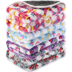 Reginary moon star pattern blanket close-up showing soft fleece and waterproof lining for dry cages.