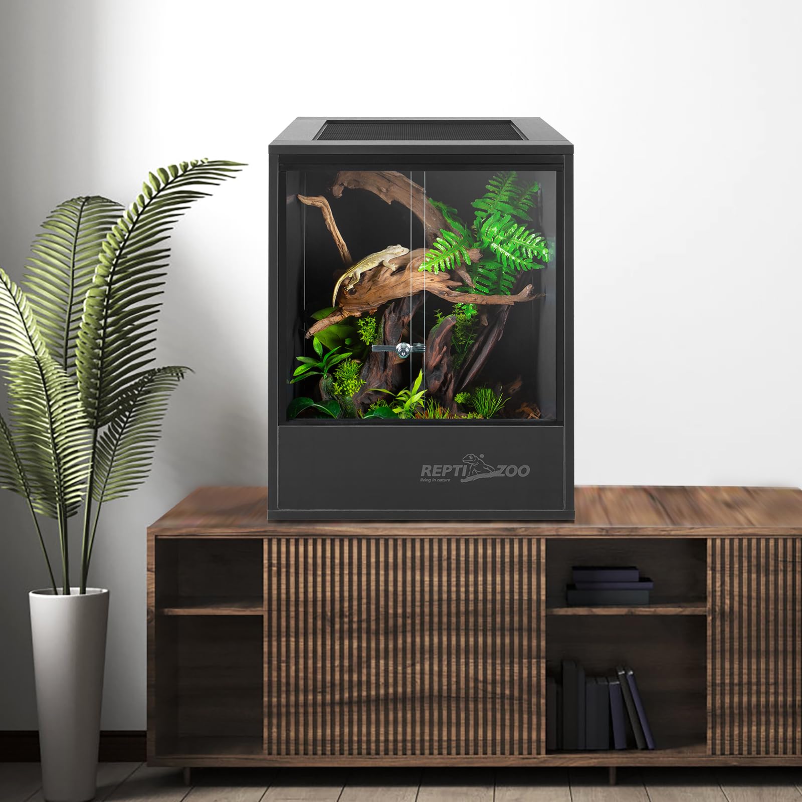 REPTI ZOO 30 Gal Tall Tank with inhabitants illustrates versatile rainforest enclosure.