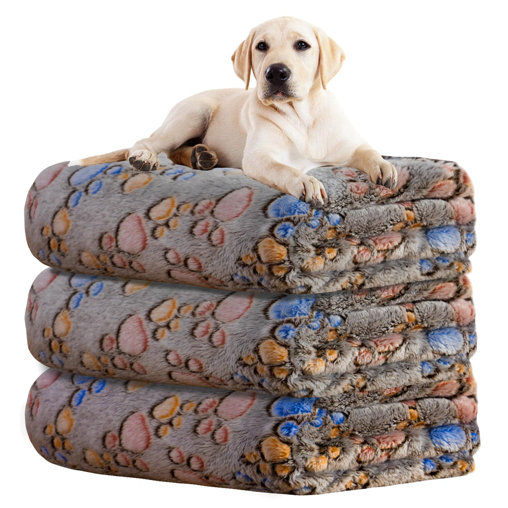 Rezutan dog blankets trio pack on bed offering cozy warmth for pets.