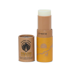Rhino Wax dog paw beach-application shows a protective layer before sandy play.