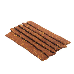 ROAM Ossy Jerky Ostrich Treats dog-snacking showing highly digestible protein bite.