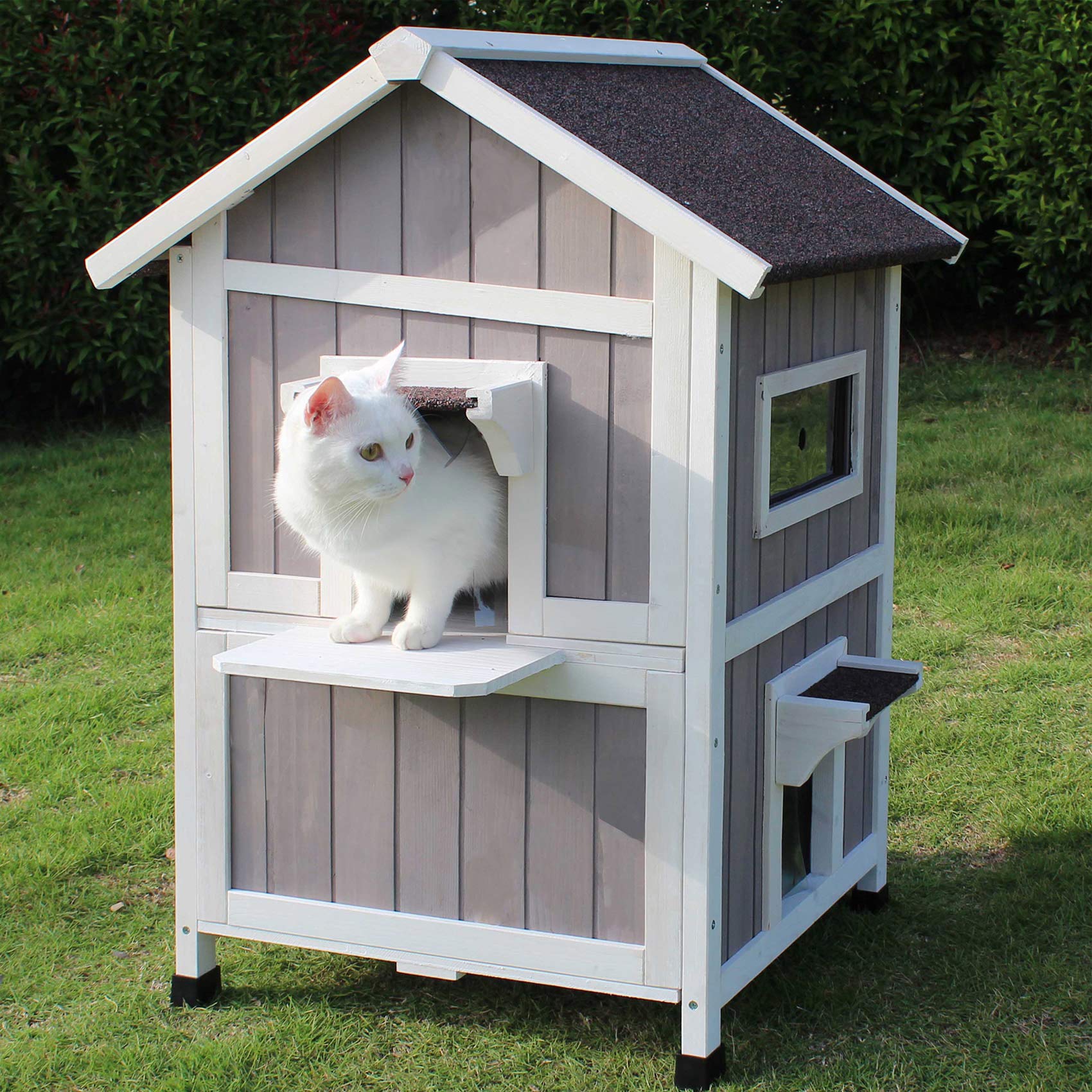 Rockever Outdoor Cat House assembly with drilled parts and sturdy setup.