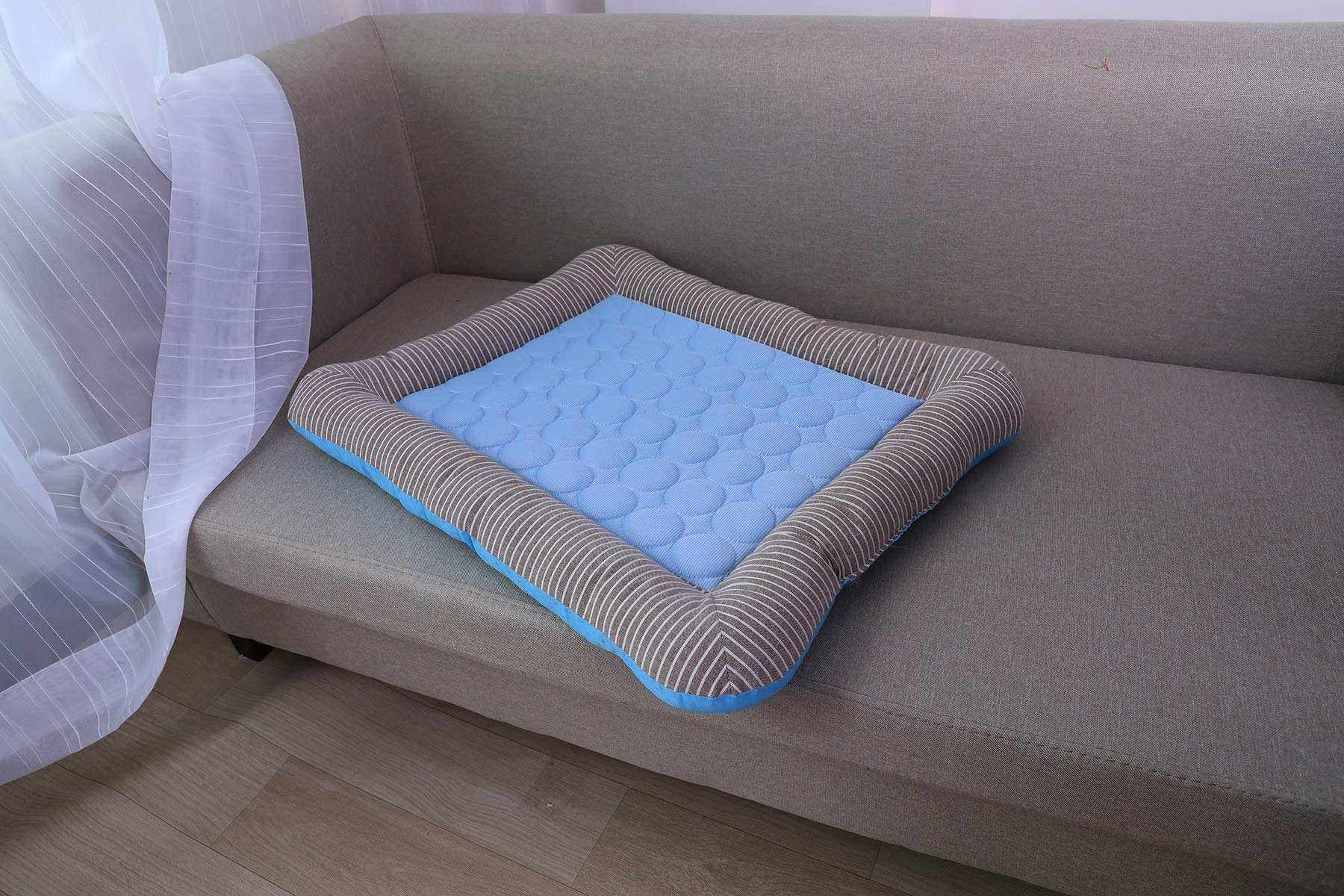 RPGT Summer Pet Self Cooling Mat on car seat for portable cooling during trips.