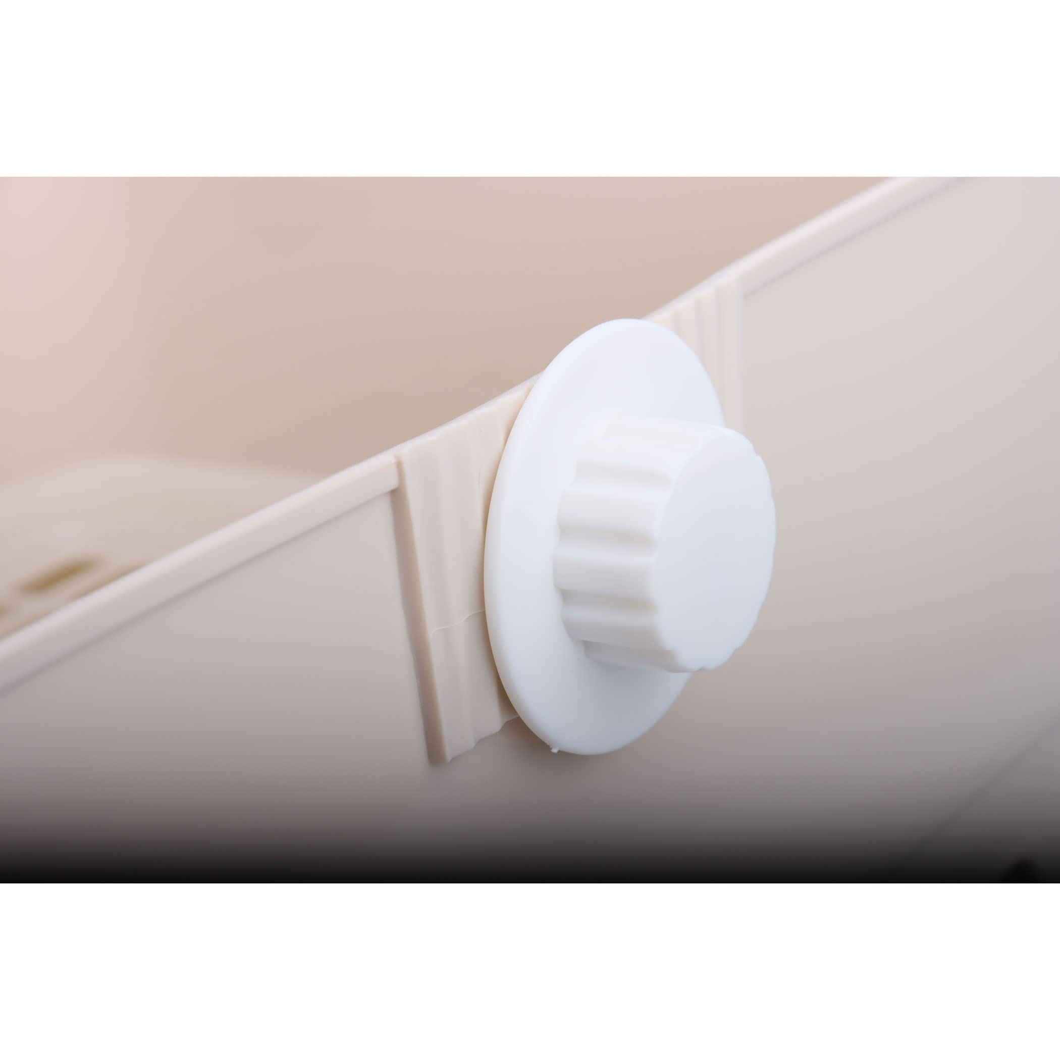 RubyHome pull-out drawer feature for quick waste disposal and pad replacement.