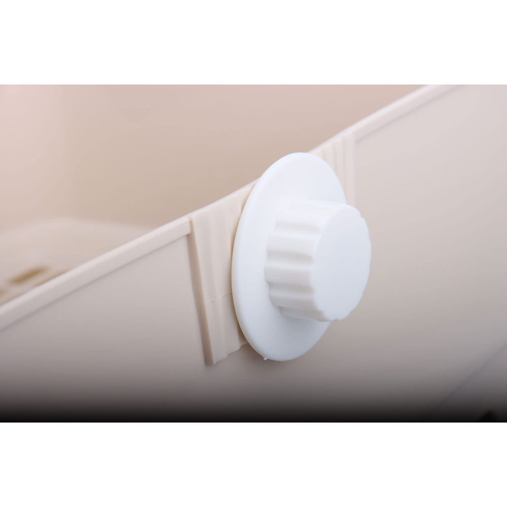 RubyHome pull-out drawer feature for quick waste disposal and pad replacement.