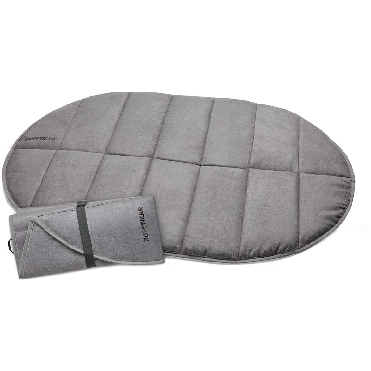 Ruffwear Highlands Pad open at campsite, insulated comfort on cold ground.