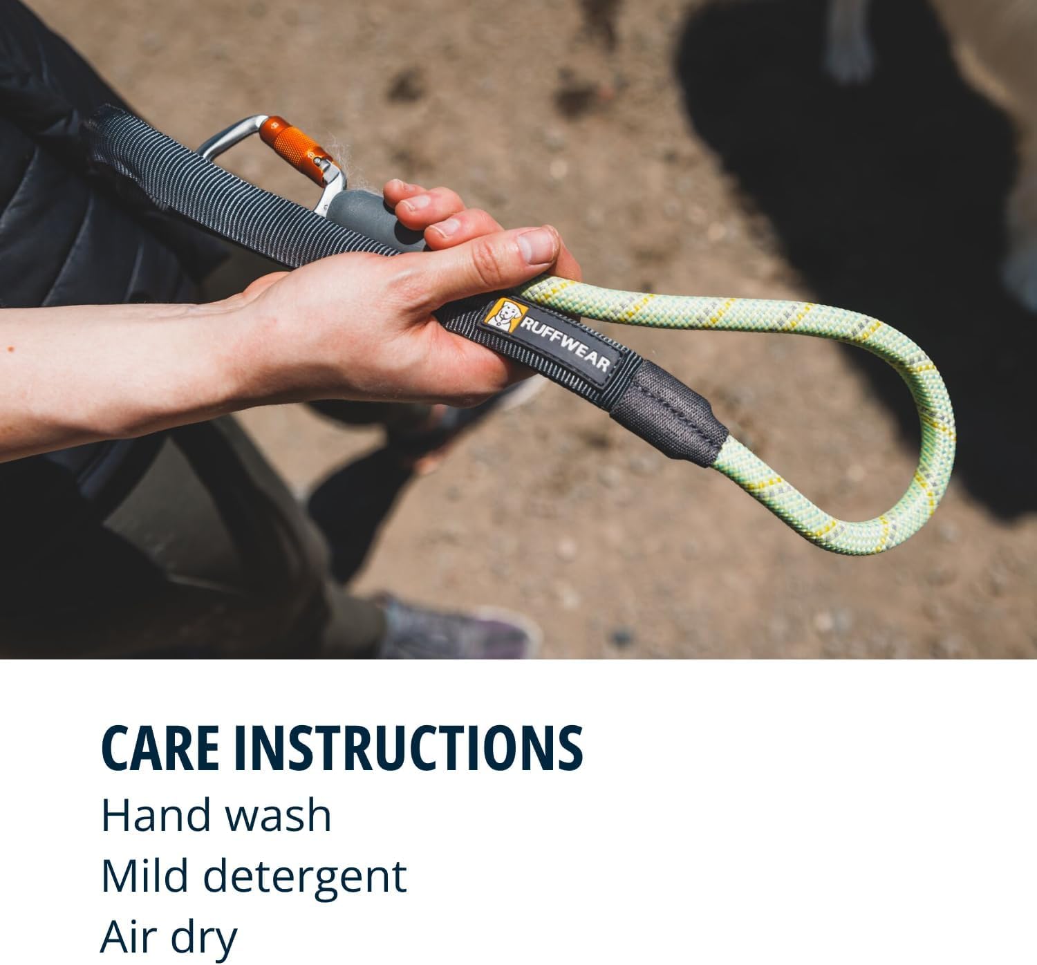 Accessory loop near the handle for carrying small items on walks.