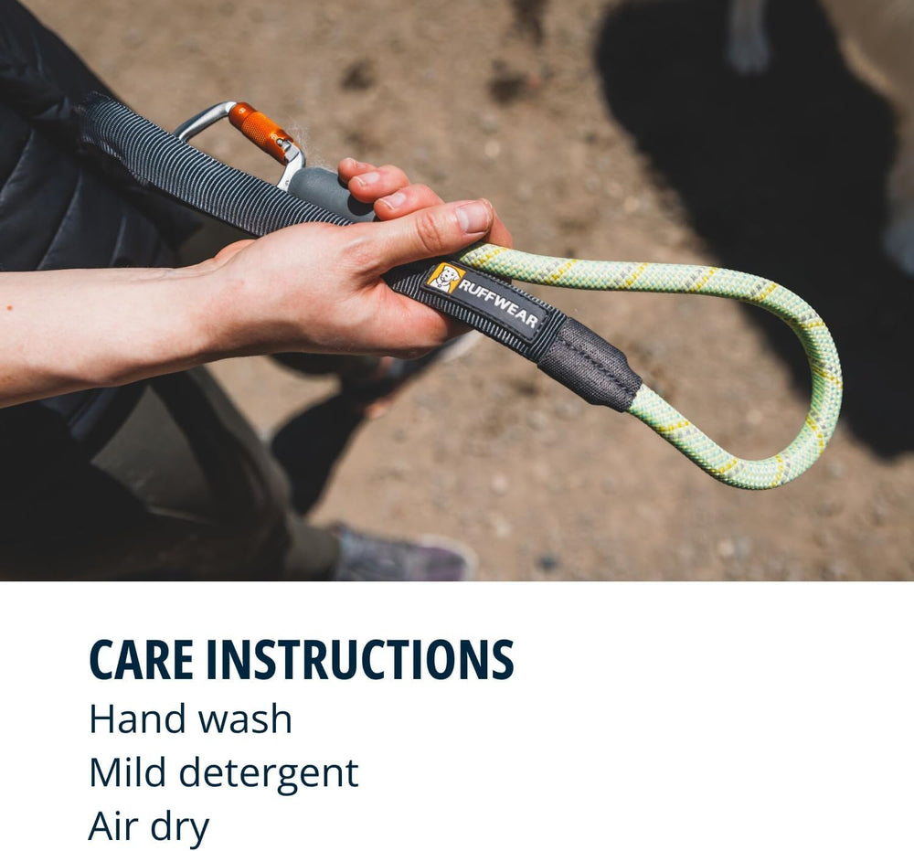 Accessory loop near the handle for carrying small items on walks.