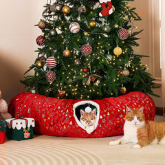 Rywell 3-in-1 cat tunnel under Christmas tree creates playful space while protecting ornaments.