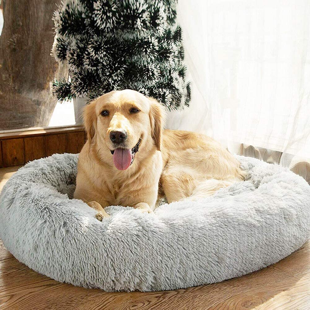 SAVFOX Calming Dog Bed plush donut large — supportive rim eases joints for larger dogs.