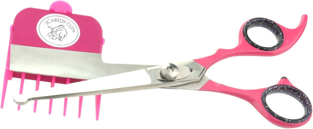 Scaredy Cut right-handed pink handle close-up highlights comfortable grip during grooming.