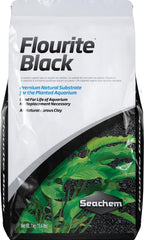 Seachem Flourite Black gravel close-up highlighting stable porous clay for planted tanks.