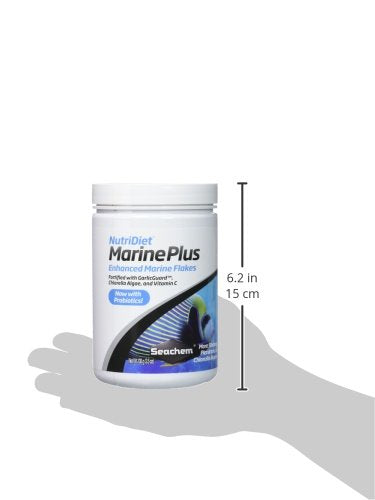 Seachem NutriDiet Marine Plus Flakes flakes in dish illustrating quick digestion and reduced waste.