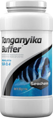 Seachem Tanganyika Buffer bottle pour demonstrates pH adjustment for stable Tanganyikan tanks.