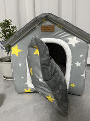 SEAHOME dog house grey folded design highlights portable, easy to store shelter.