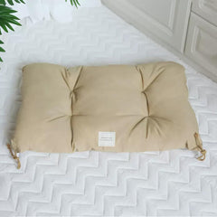 SHENGOCASE kneading pillow bed inside a kennel inviting restful kneading