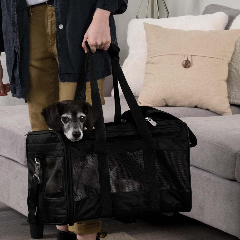Sherpa Original Deluxe Carrier large side view highlights compact under-seat fit.