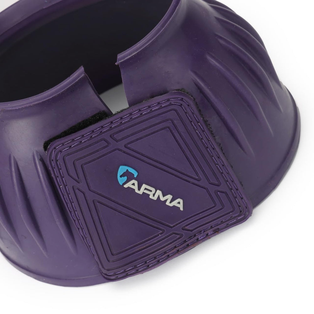 Shires Arma overreach bell boots strap closure close-up for secure fit