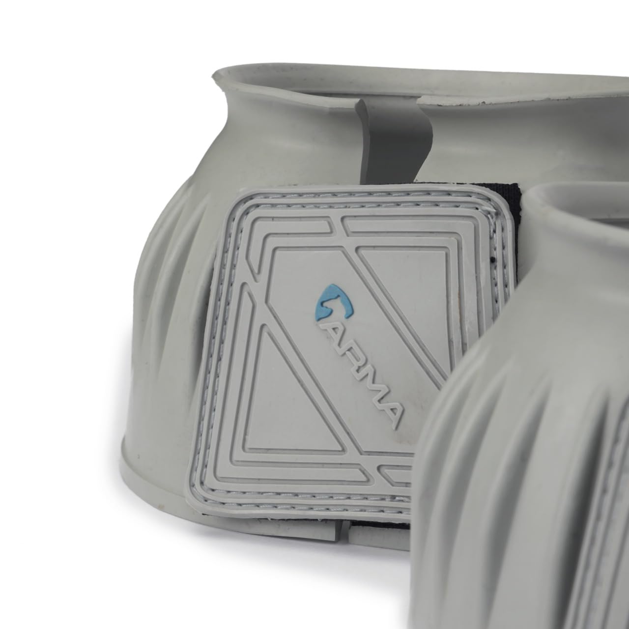 Shires Arma Overreach Cob Grey Bell Boot close-up strap shows rubber-covered fastenings for secure fit.