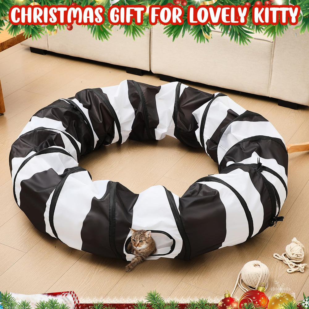 Under the Christmas tree, a decorative yet functional cat activity space.